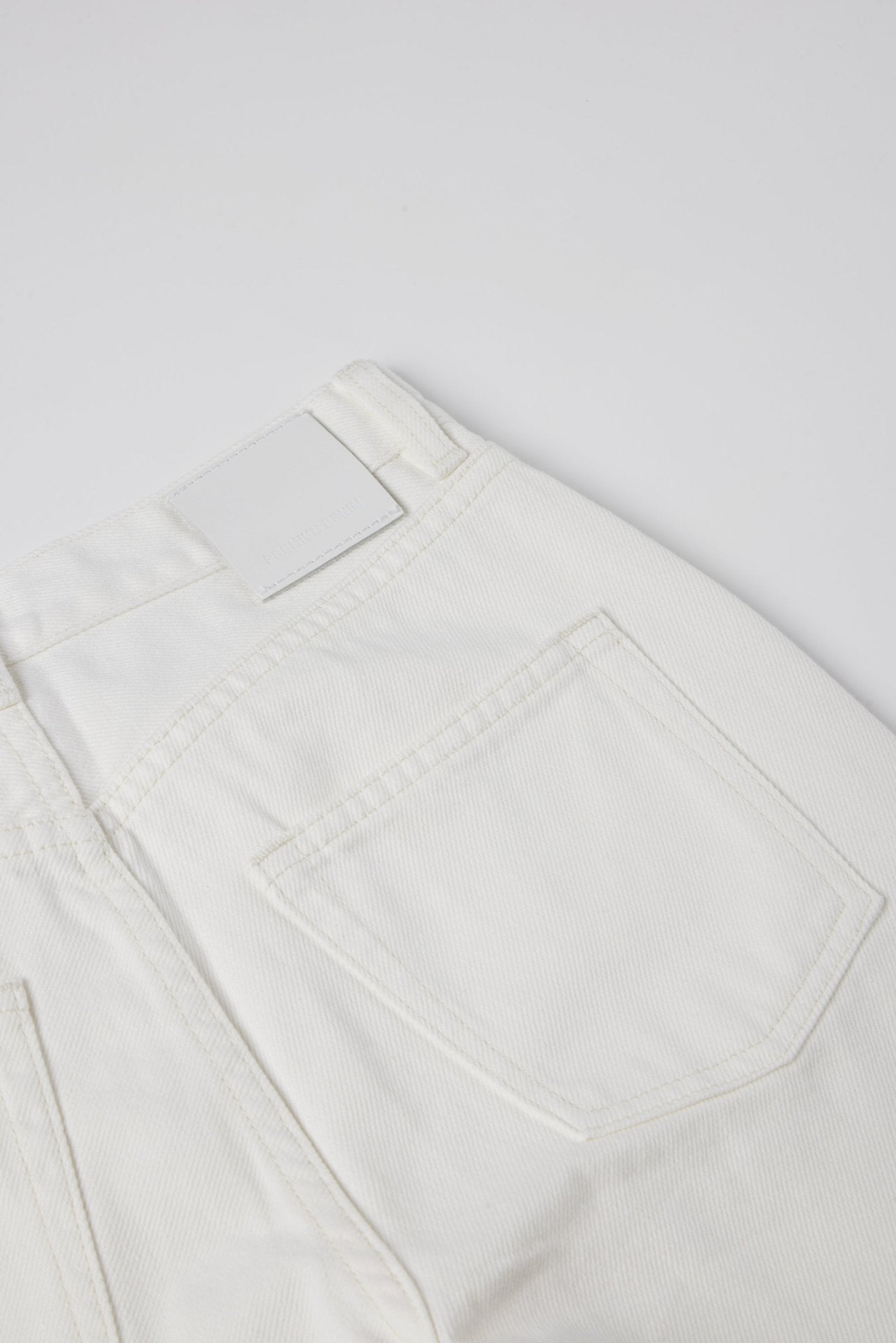 Original twisted high-rise straight-leg jeans (White) - STELLAM